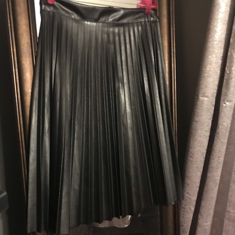 Pleated faux leather skirt.